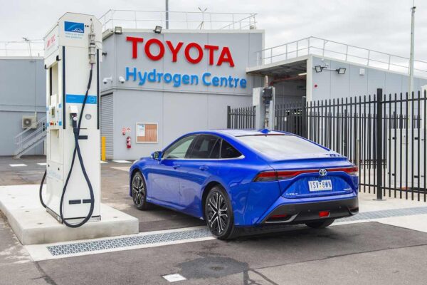 Toyota Mirai hydrogen fuel cell car at refueling station